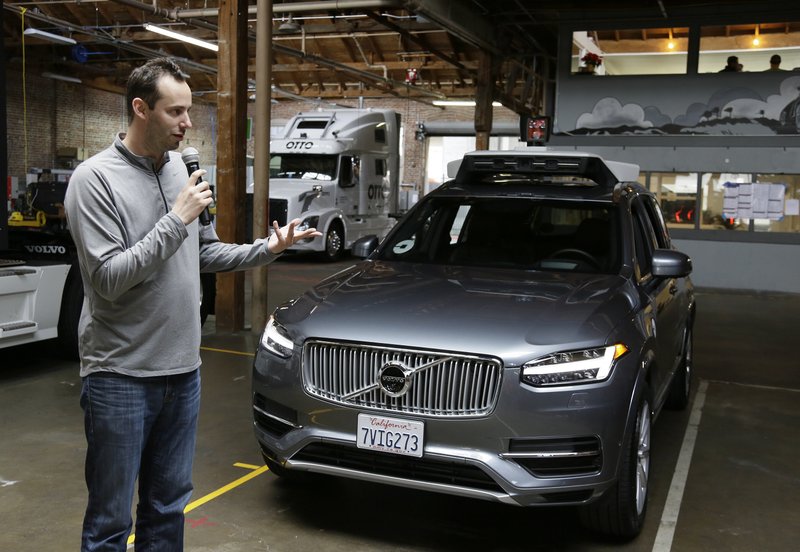 FILE - In this Dec. 13, 2016, file photo, Anthony Levandowski, head of Uber's self-driving program, speaks about their driverless car in San Francisco.