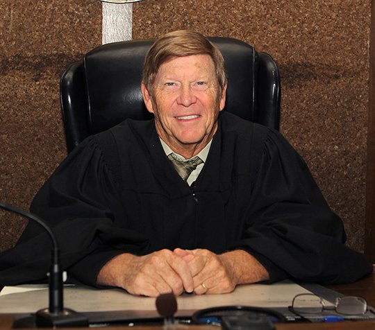 The Sentinel-Record/Richard Rasmussen JUDGE OF THE YEAR: Garland County Circuit Court Judge John Homer Wright, seated in his courtroom Friday, was named Outstanding Trial Judge of the Year by the Arkansas Trial Lawyers Association on April 28.