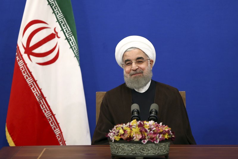 Iranian President Hassan Rouhani attends a televised speech after he won the election, in Tehran, Iran, Saturday, May 20, 2017. Rouhani says that the message of Friday's election that gave him another four-year term is one of Iran living in peace and friendship with the world.