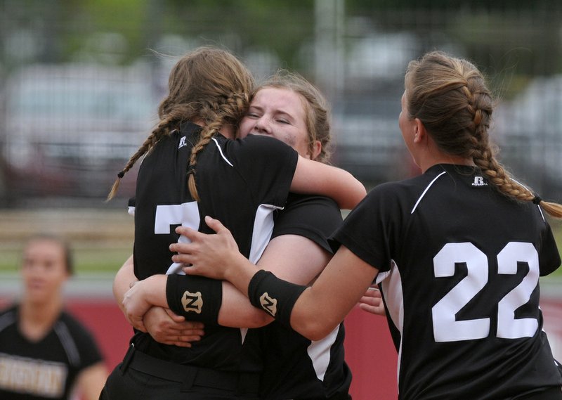 Macy Ratliff (left) and Kristen Hurst of Rison celebrate after defeating Spring Hill Saturday, May 20, 2017, during the 2A State Championship softball game at Bogle Park in Fayetteville