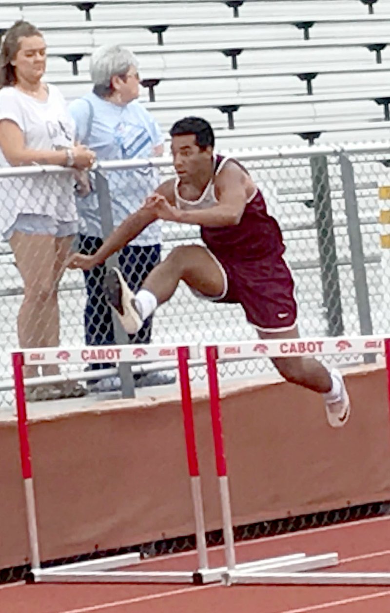 Photo submitted Siloam Springs senior J.D. Horn competes in the 110-meter hurdles Thursday at the Arkansas high school decathlon at Panther Stadium in Cabot. Horn finished 43rd out of 77 participants.