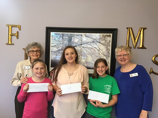 Submitted photo ECOLOGY CAMPERS: Josie Farrell, left, with the Audubon Society of Hot Springs Village, stands with Fountain Lake scholarships winners Kiley Branch, Bailey Helton and Stephanie Thurman, along with member Teri LaBove.