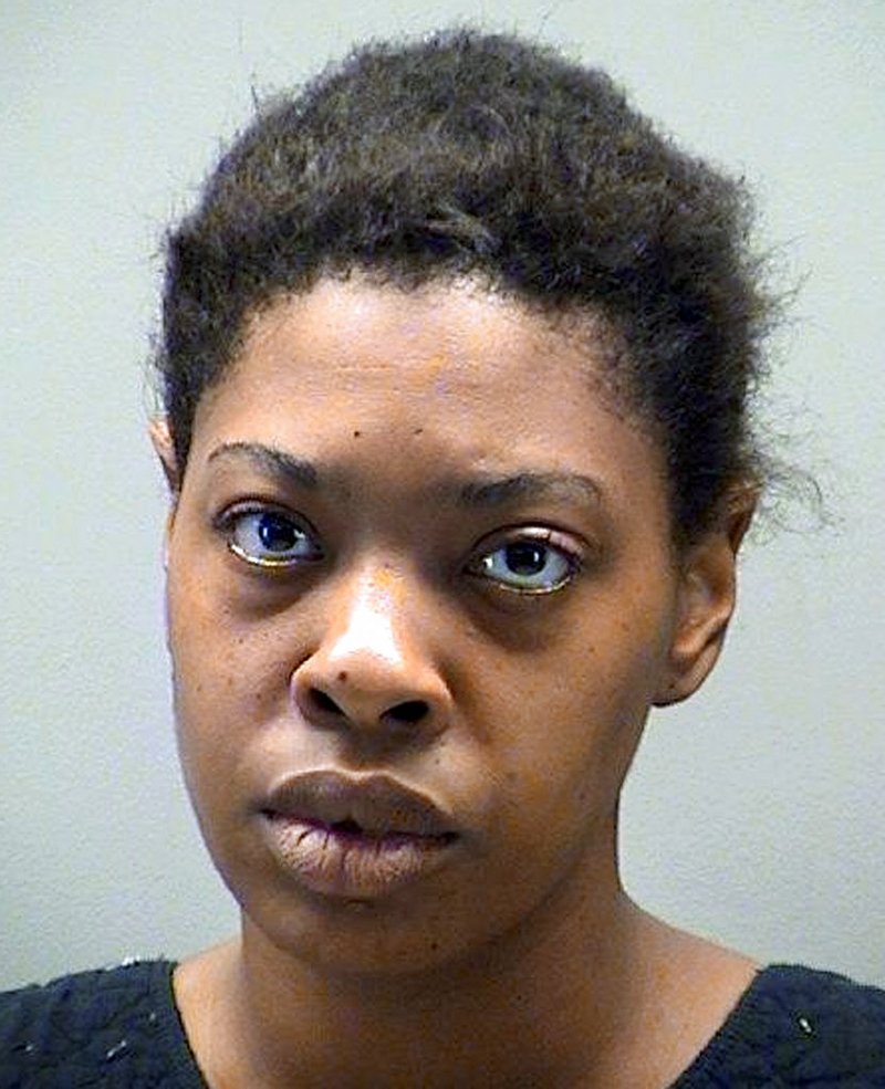 This undated photo released by the Montgomery County jail in Dayton, Ohio, shows Claudena Helton, arrested Thursday, May 18, 2017, and accused of shooting two of her children in the head and leaving them outside their home. 
