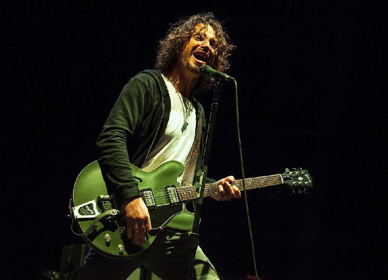 The late Chris Cornell, pictured here at a show in 2013, was the lead singer of Soundgarden and Audioslave 
