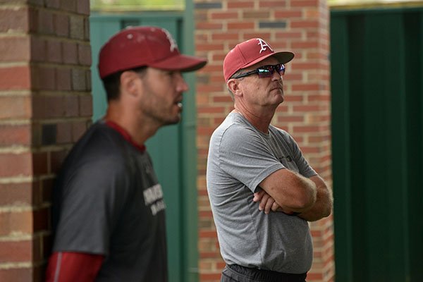 Tony Vitello (left), Arkansas assistant coach, and Dave Van Horn, Arkansas head coach, watch as players take batting practice Tuesday, May 23, 2017, during practice at Jerry D. Young Memorial Field on the campus of UAB in Birmingham, Ala. 
