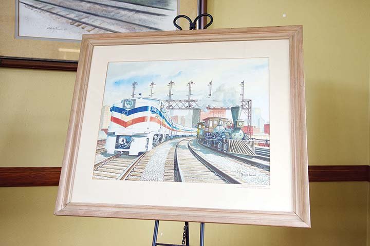 Howard Fogg, a renowned train artist, was commissioned to do two paintings of the 1947 Freedom Train that toured across the United States with an exhibit of historic documents. This second painting of the Freedom Train was thought to have been lost but hung in the home of Larry and Johnnie Taylor for more than 20 years before they learned of its true identity. The Youngs will display the painting during Saturday’s Reunion ’Round the Rails event in Russellville.