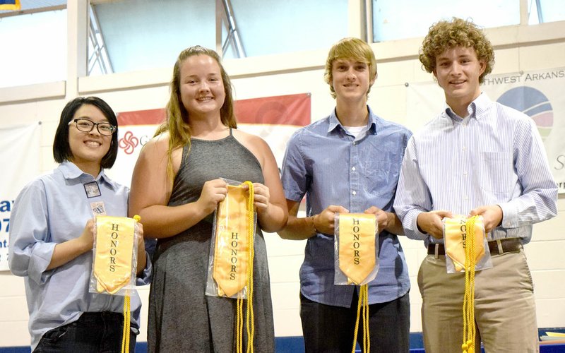 Photo by Mike Eckels Five honor graduates of Decatur High School received their gold sash and cords during the 2017 Decatur Awards Ceremony at Peterson Gym in Decatur May 8. The honor students included Shaney Lee (left), Cameron Shaffer, Bracy Owens, Ryan Shaffer and Dylan Frydrychowski (not pictured).