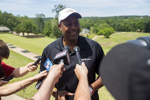 Former Arkansas basketball player Sidney Moncrief speaks with members of the media during Mike Anderson's celebrity golf tournament Monday, May 22, 2017, at Shadow Valley Country Club in Rogers.
