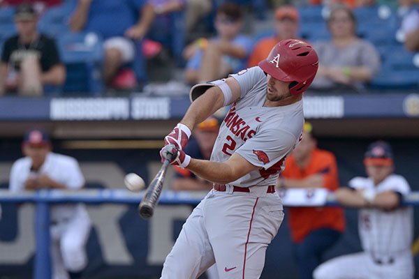 Arkansas first baseman Chad Spanberger hits a home run during a game against Auburn on Thursday, May 25, 2017, at the SEC Tournament in Hoover, Ala. 