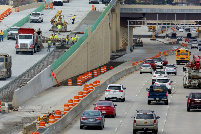FILE — Construction crews work on the Big Rock interchange in west Little Rock in this 2015 file photo.