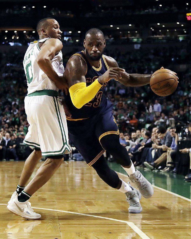 Cleveland forward LeBron James (right) is heading to his seventh consecutive NBA Finals after he scored 35 points and grabbed eight rebounds to help the Cavaliers beat Boston 135-102 in Game 5 of the Eastern Conference finals Thursday.