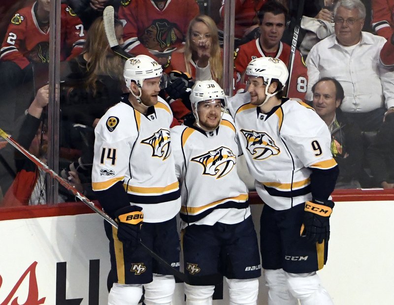 Nashville right wing Viktor Arvidsson (center), defenseman Mattias Ekholm (left) and center Filip Forsberg are three of six Swedish players on the team. In all, 89 Swedes played on NHL rosters during the regular season.