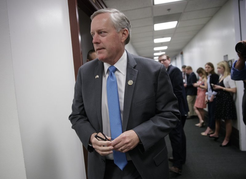 In this March 28, 2017 file photo, House Government Operations subcommittee Chairman Rep. Mark Meadows, R-N.C. walks on Capitol Hill, in Washington. 