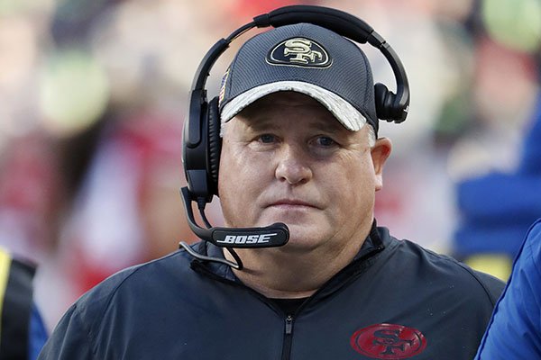 In this Jan. 1, 2017, file photo, San Francisco 49ers head coach Chip Kelly stands on the sideline during the second half of an NFL football game against the Seattle Seahawks in Santa Clara, Calif. Former Oregon coach Chip Kelly is joining ESPN as a studio analyst next season. ESPN announced Friday, May 26, 2017, it has signed Kelly to a multiyear deal. (AP Photo/Tony Avelar, File)

