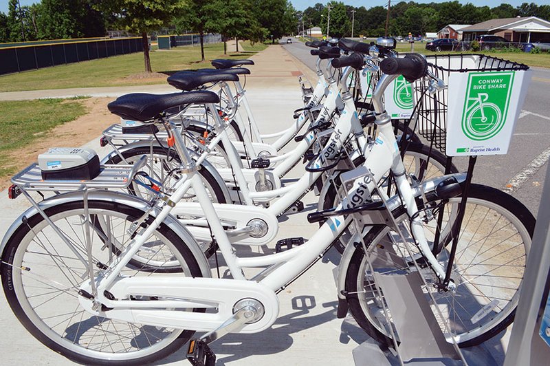 Bicycles are lined up at Conway Station Park on Robins Street. The bike-share program, officially launched Wednesday, allows people to rent a bicycle for $2 an hour, with monthly and annual memberships available. It’s the first on-demand bike-share program in the state, city officials said. It is funded by the city’s Advertising and Promotion funds, as well as Baptist Health, the presenting sponsor.