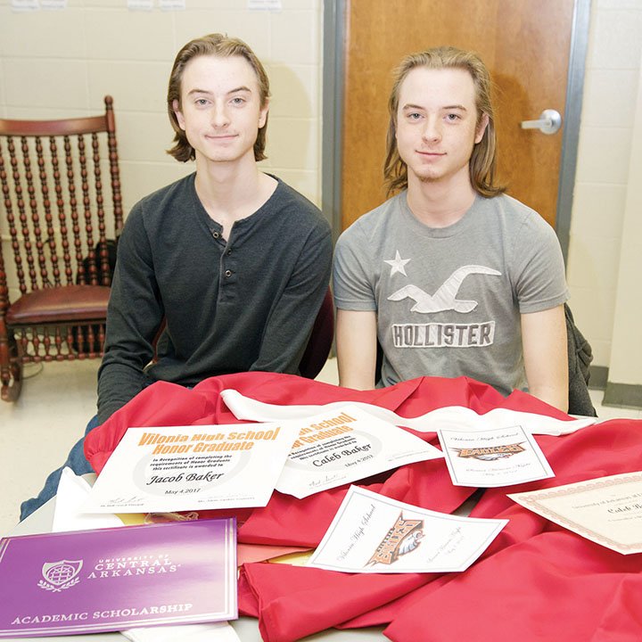 Jacob Baker, left, and his twin brother, Caleb, graduated recently from Vilonia High School. They have attended Vilonia schools together since kindergarten but will attend different colleges in the fall. Jacob will go to the University of Central Arkansas in Conway, and Caleb will attend the University of Arkansas at Little Rock.