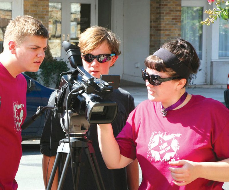 From left, Payton Hubbard, Trey Ramm and instructor Juli Jackson participate in a Script to Screen workshop at the 2013 T Tauri Movie Camp in Batesville. Judy Pest, executive director of the Ozark Foothills FilmFest, said Script to Screen is the only workshop that has been continuously offered since the camp began in 2005 and remains the most popular.