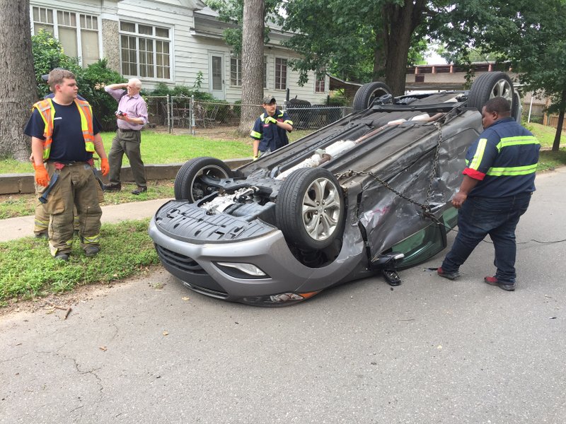 Authorities respond to a two-vehicle crash in which an Elantra flipped at the intersection of 16th and South Summit streets around 1:20 p.m. Friday, May 26, 2017.