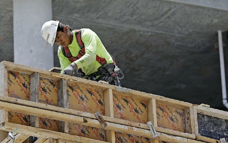 Work continues this month on a high-rise apartment in Miami. Though economic growth was sluggish in the first quarter, analysts envision a rebound in the current quarter fueled by solid hiring and more consumer spending. 