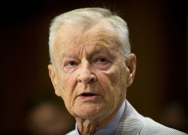 In this July 9, 2014 file photo, former National Security Adviser Zbigniew Brzezinski testifies on Capitol Hill in Washington, before the Senate Foreign Relations Committee hearing to examine Russia and developments in Ukraine. 