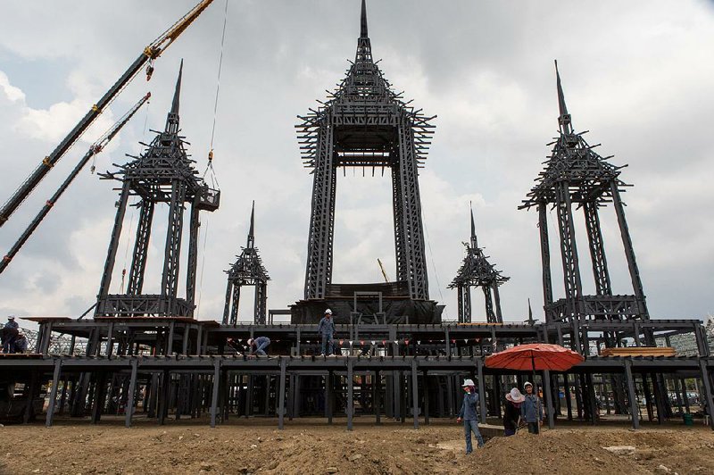 Construction of the 165-foot-high royal pyre in Sanam Luang, Thailand, for King Bhumibol Adulyadej’s cremation has been ongoing in preparation for his funeral in October. 