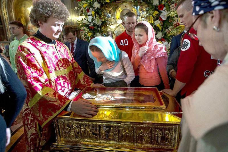 Russian Orthodox believers line up to kiss the relics of Saint Nicholas in Moscow’s Cathedral of Christ the Savior. The relics will be moved to St. Petersburg, Russia, in mid-June before being returned to Basilica di San Nicola in Bari, Italy. 