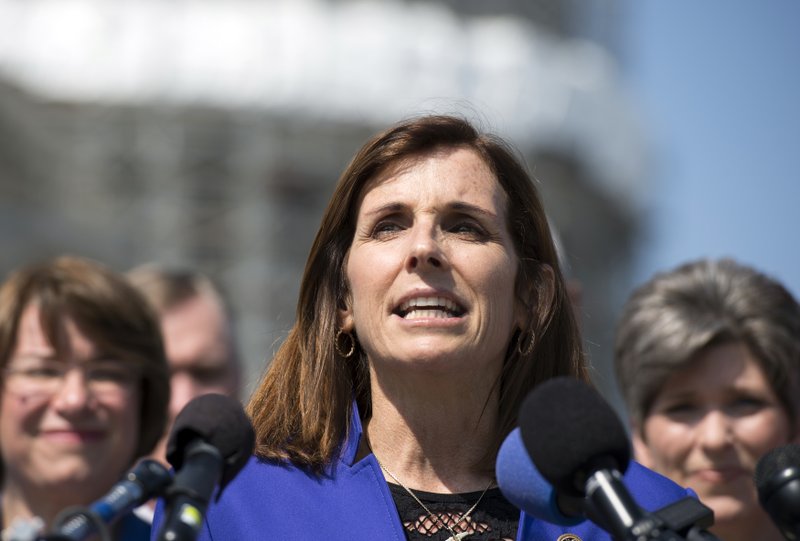 FILE - In this March 16, 2016 file photo, Rep. Martha McSally, R-Ariz. speaks on Capitol Hill in Washington. The A-10 Warthog attack plane with the ungainly shape and odd nickname has been given new life, spared by Air Force leaders who have reversed the Obama administration's view of the plane as an unaffordable extra in what had been a time of tight budgets. McSally, who flew the A-10 in combat and commanded a squadron in Afghanistan, speaks of it with obvious affection. (AP Photo/Molly Riley, File)