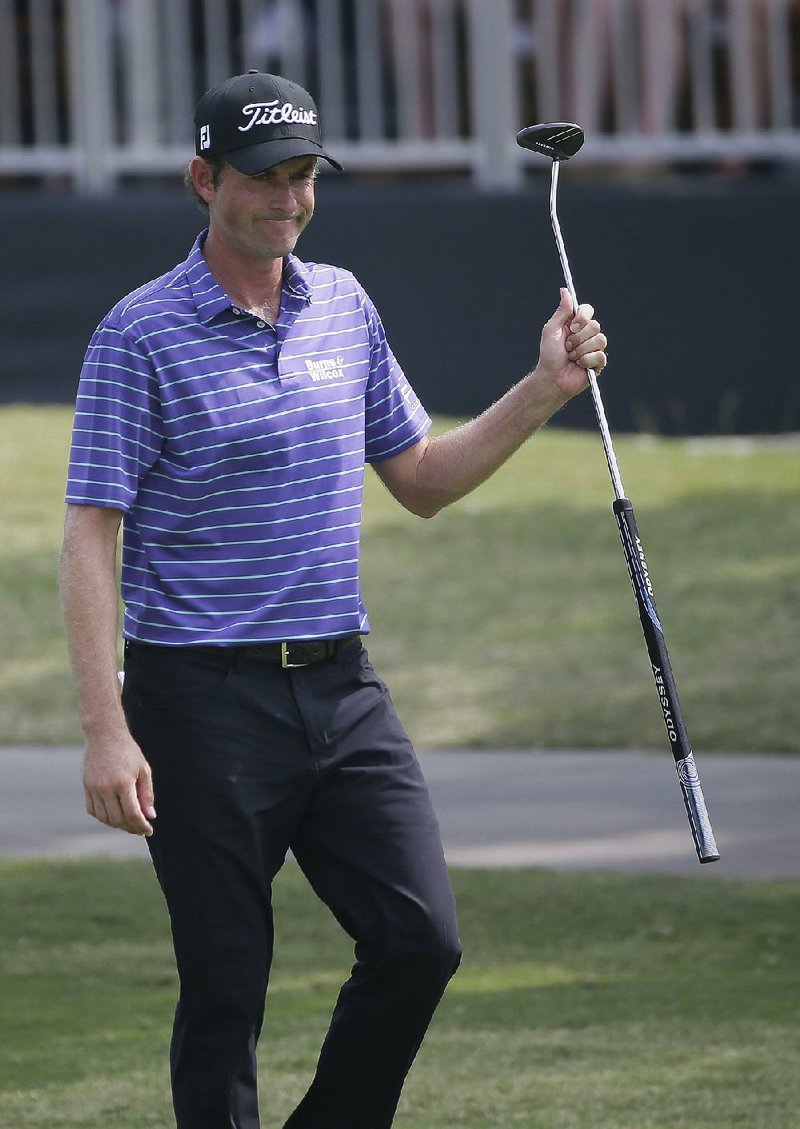 Webb Simpson holds his putter during the third round of the Dean & DeLuca Invitational golf tournament at Colonial Country Club in Fort Worth, Texas, Saturday, May 27, 2017. 