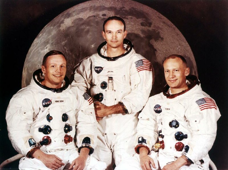 Astronauts Neil Armstrong, left, Michael Collins, center, and Edwin A. Aldrin, are pictured in this 1969 Apollo II crew portrait.