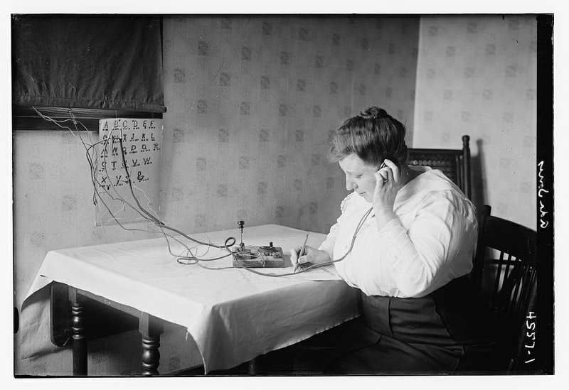 Opera singer Ada Jones using Morse code in 1915.  Library of Congress archives.