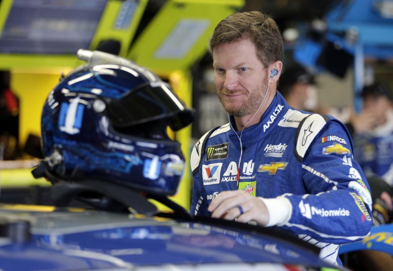 Dale Earnhardt Jr. prepares to practice for Sunday's NASCAR Cup series auto race at Charlotte Motor Speedway in Concord, N.C., Thursday, May 25, 2017. (AP Photo/Chuck Burton)