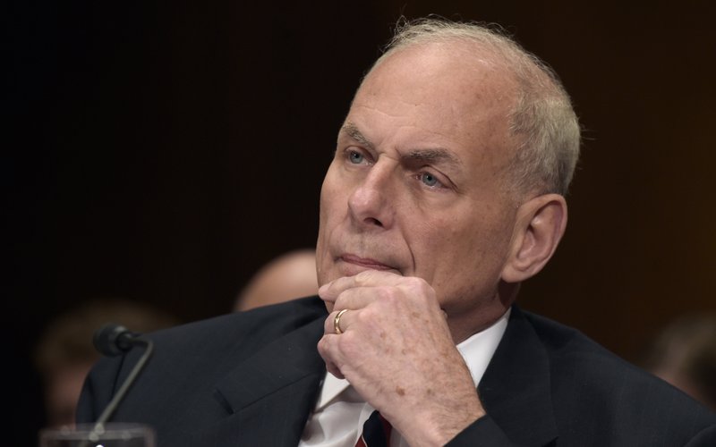 In this Thursday, May 25, 2017, file photo, Homeland Security Secretary John Kelly listens on Capitol Hill in Washington, while testifying before a Senate Appropriations subcommittee on FY'18 budget. Kelly said he's considering banning laptops from the passenger cabins of all international flights to and from the United States. That would dramatically expand a ban announced in March that affects about 50 flights per day from 10 cities, mostly in the Middle East.