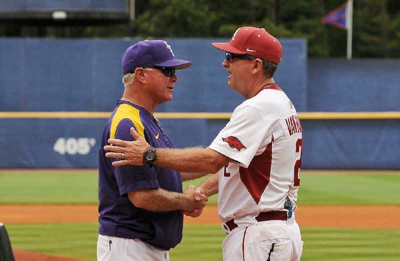 LSU Coach Paul Mainieri (left) and Arkansas Coach Dave Van Horn will get a chance to stay at home this week after their respective teams were selected as regional hosts for the NCAA Division I baseball tournament.