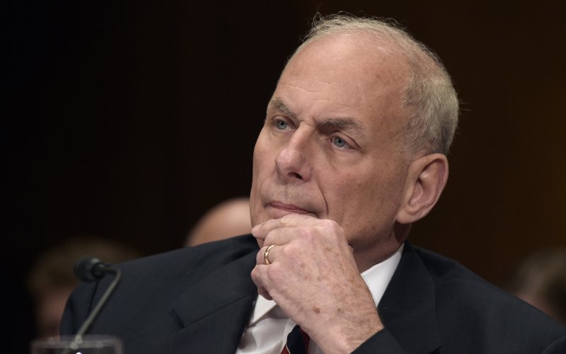 In this Thursday, May 25, 2017, file photo, Homeland Security Secretary John Kelly listens on Capitol Hill in Washington, while testifying before a Senate Appropriations subcommittee on FY'18 budget. Kelly said he's considering banning laptops from the passenger cabins of all international flights to and from the United States. 