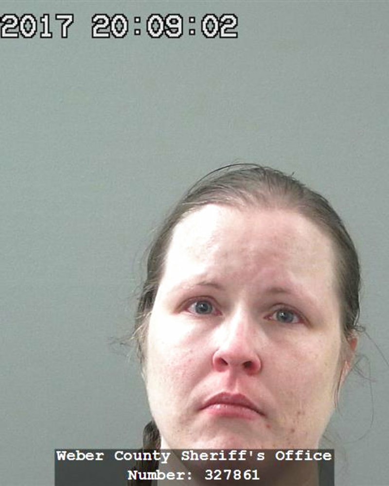 This Thursday, May 25, 2017 booking photo released by the Weber County Sheriff's Office shows Tori Lee Castillo, 39. The Utah woman was arrested after she allegedly locked her two young children in her car's trunk while she went inside a Wal-Mart store to shop. Riverdale police say witnesses heard the children ages 2 and 5 making noise and saw the car shaking, got the older child to pull the emergency latch and called 911. Castillo remains jailed on suspicion of child abuse after being arrested Thursday, May 25, 2017, evening when she returned to the car. 