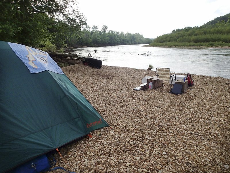 NWA Democrat-Gazette/FLIP PUTTHOFF River camping offers solitude and scenery on overnight or multiday float trips. This campsite is along the Current River in southeast Missouri.