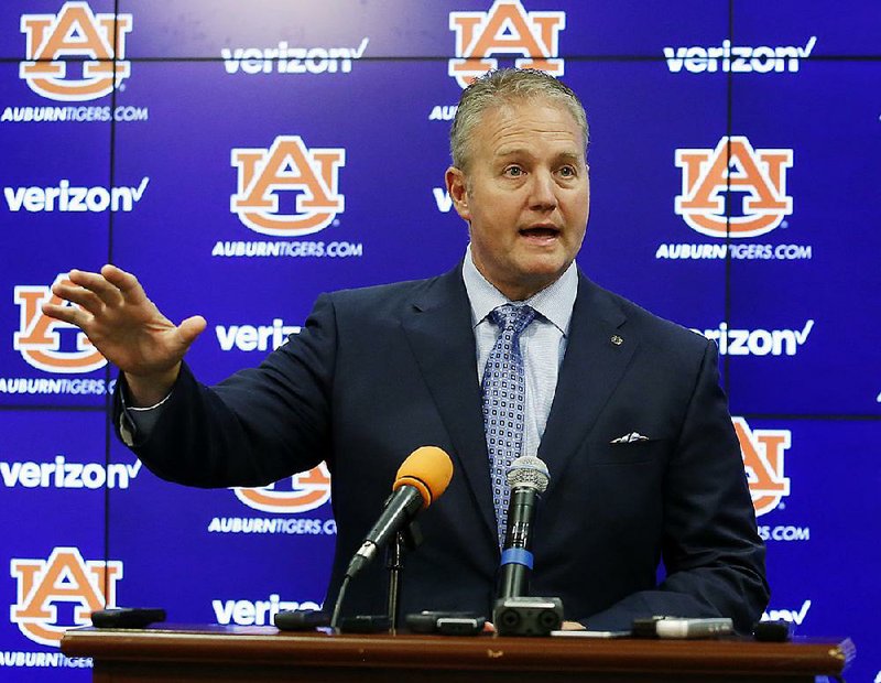 In this Oct. 22, 2015, file photo, Auburn athletic director Jay Jacobs talks to reporters in Auburn, Ala. 