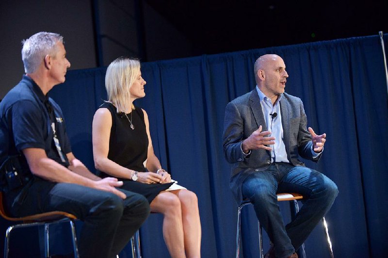 Wal-Mart’s pilot program using its own employees to deliver packages to customers was discussed Thursday by Wal-Mart U.S. President and CEO Greg Foran (from left), Jane Ewing, senior vice president for digital acceleration, and Marc Lore, president and CEO of e-commerce. 