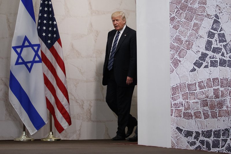 FILE - In this May 23, 2017 file photo, President Donald Trump arrives to speak at the Israel Museum in Jerusalem. A senior Israeli official is expressing disappointment over Trump&#x2019;s decision against relocating the embassy to Jerusalem and is accusing the U.S. of caving in to Arab pressure. (AP Photo/Evan Vucci, File)