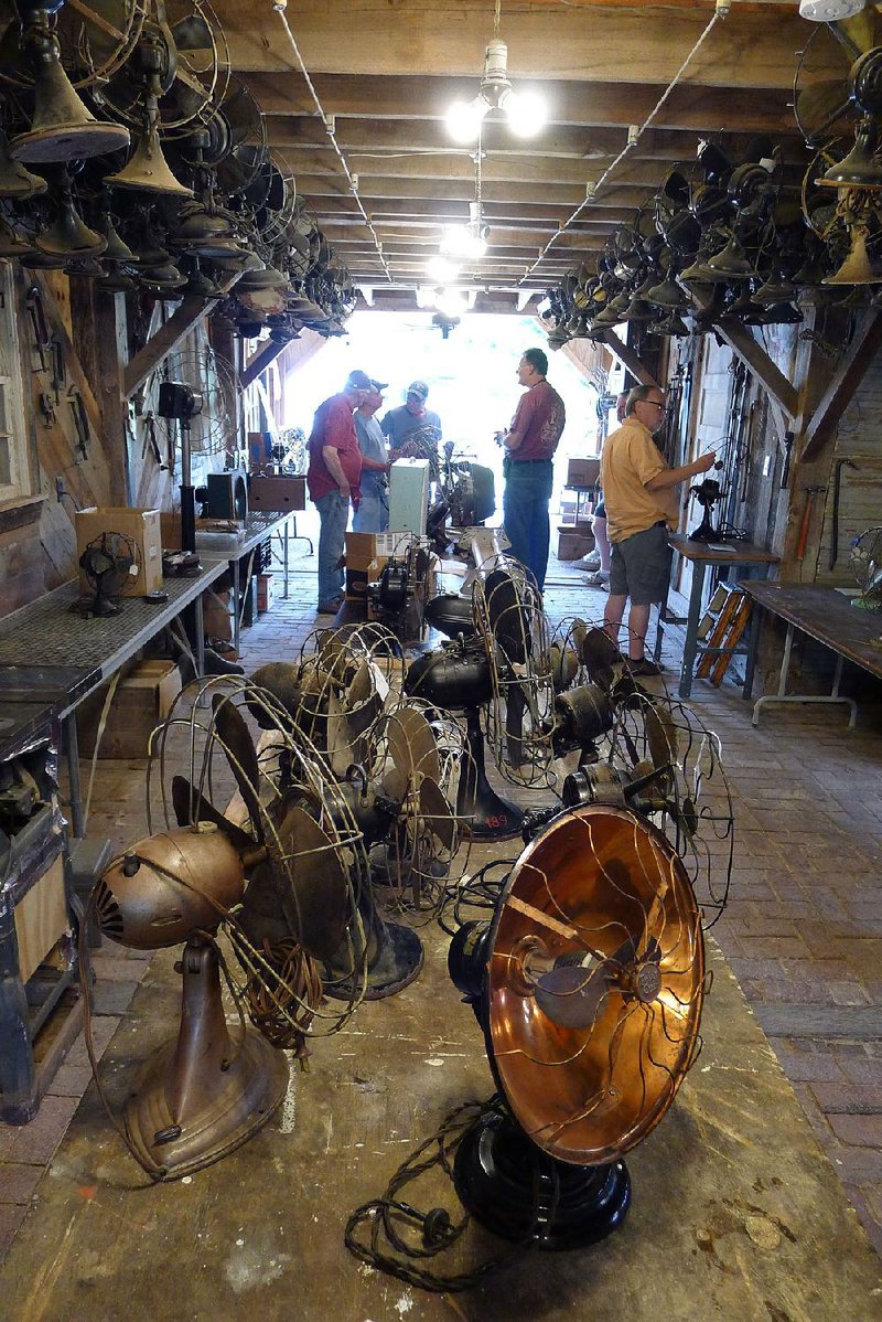 Dr. Geoff Dunaway’s barn in Harrison was full of fans and collectors participating  in Pig Pickin’ XXI, a convention of antique-fan collectors, which Dunaway has held at his home for 20 years.