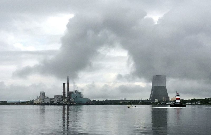 The Brayton Point Power Station, New England’s largest and one of its last coal-fired power plants, appears on a cloudy day late last month in Somerset, Mass.
