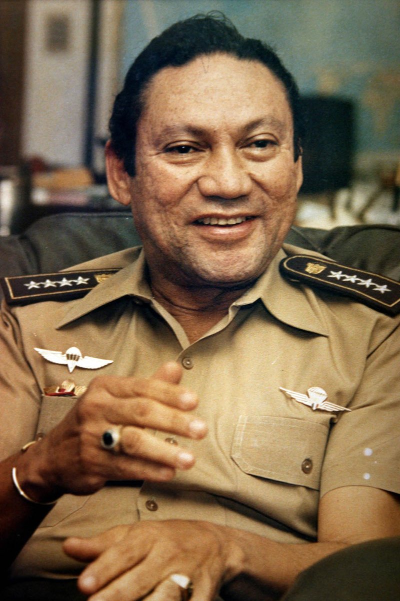 Panamanian military strongman Gen. Manuel Antonio Noriega talks to reporters in Panama City, in this Nov. 8, 1989, file photo. Noriega died Monday. But for two evangelical Christians, Noriega became the ultimate jailhouse convert.