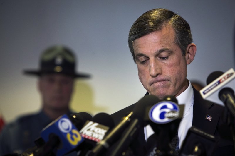 FILE - In this Feb. 2, 2017, file photo, Delaware Gov. John Carney speaks at a news conference in Smyrna, Del., on the loss of one of the prison guard at Vaughn Correctional Center during the hostage situation. An independent review ordered by Delaware's governor after a deadly inmate riot at the James T. Vaughn Correctional Center, describes the state's maximum-security prison as dangerously overcrowded, critically understaffed, and poorly run and managed. (Suchat Pederson/The Wilmington News-Journal via AP, File)