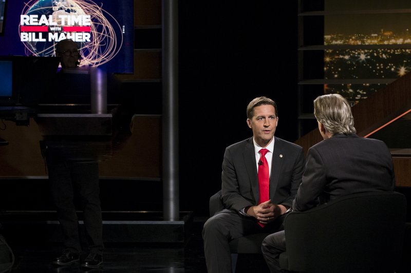 In this photo provided by HBO, Bill Maher, left, speaks with Sen. Ben Sasse, R-Neb, during a segment of his "Real Time with Bill Maher," Friday, June 2, 2017. Maher is facing criticism for his use of a racial slur during a discussion with the Republican senator on his HBO talk show Friday night. 