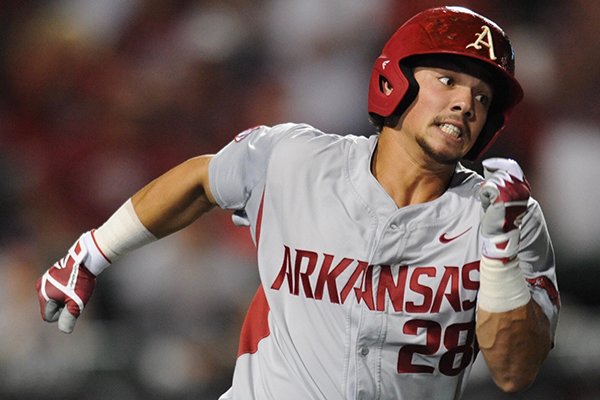 Arkansas center fielder Dominic Fletcher runs the bases after recording an RBI hit during the fifth inning of an NCAA Tournament game against Missouri State on Saturday, June 3, 2017, in Fayetteville. 