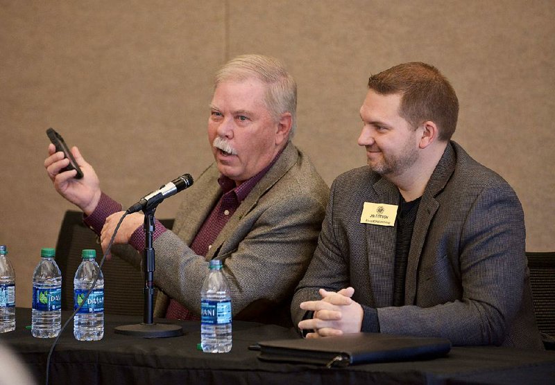 Dan Douglas (left, R-Bentonville) and fellow Arkansas state representative Jim Dotson (R-Bentonville) take part in the discussion on Saturday Jan. 28, 2017 during a state legislative forum at the Shewmaker Center for Global Business Development at Northwest Arkansas Community College in Bentonville.