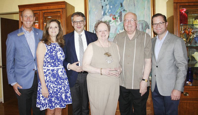 NWA Democrat-Gazette/CARIN SCHOPPMEYER Peter Lane, Walton Arts Center president and CEO, and Barb Putman (from left), Corrado Rovaris, Artosphere music director, Mary Ann and Reed Greenwood and Brock Gearhart gather at the Greenwoods' home for a reception May 16.