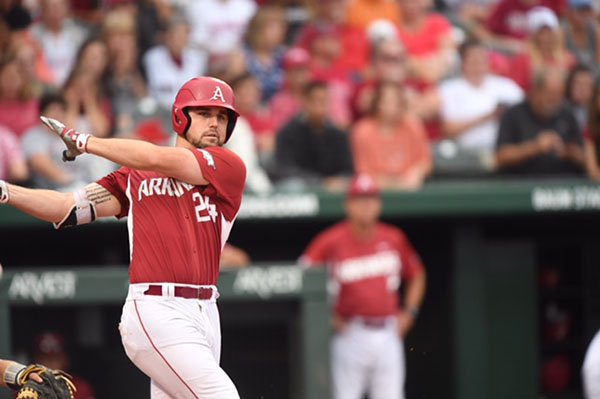 Arkansas first baseman Chad Spanberger hits a home run during an NCAA Tournament game against Oral Roberts on Sunday, June 4, 2017, in Fayetteville. 