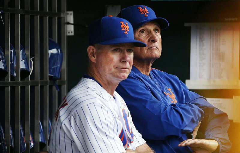 New York Mets Manager Terry Collins (right), who has a sub-.500 record with the Mets, is leading a struggling
team again this year.