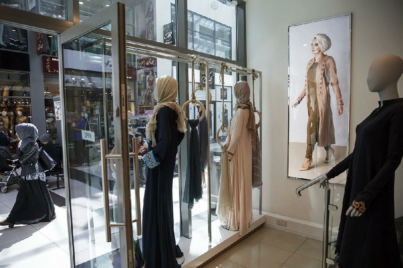 Clothes are displayed at the Aab store at Upton Park, in London, last month.
